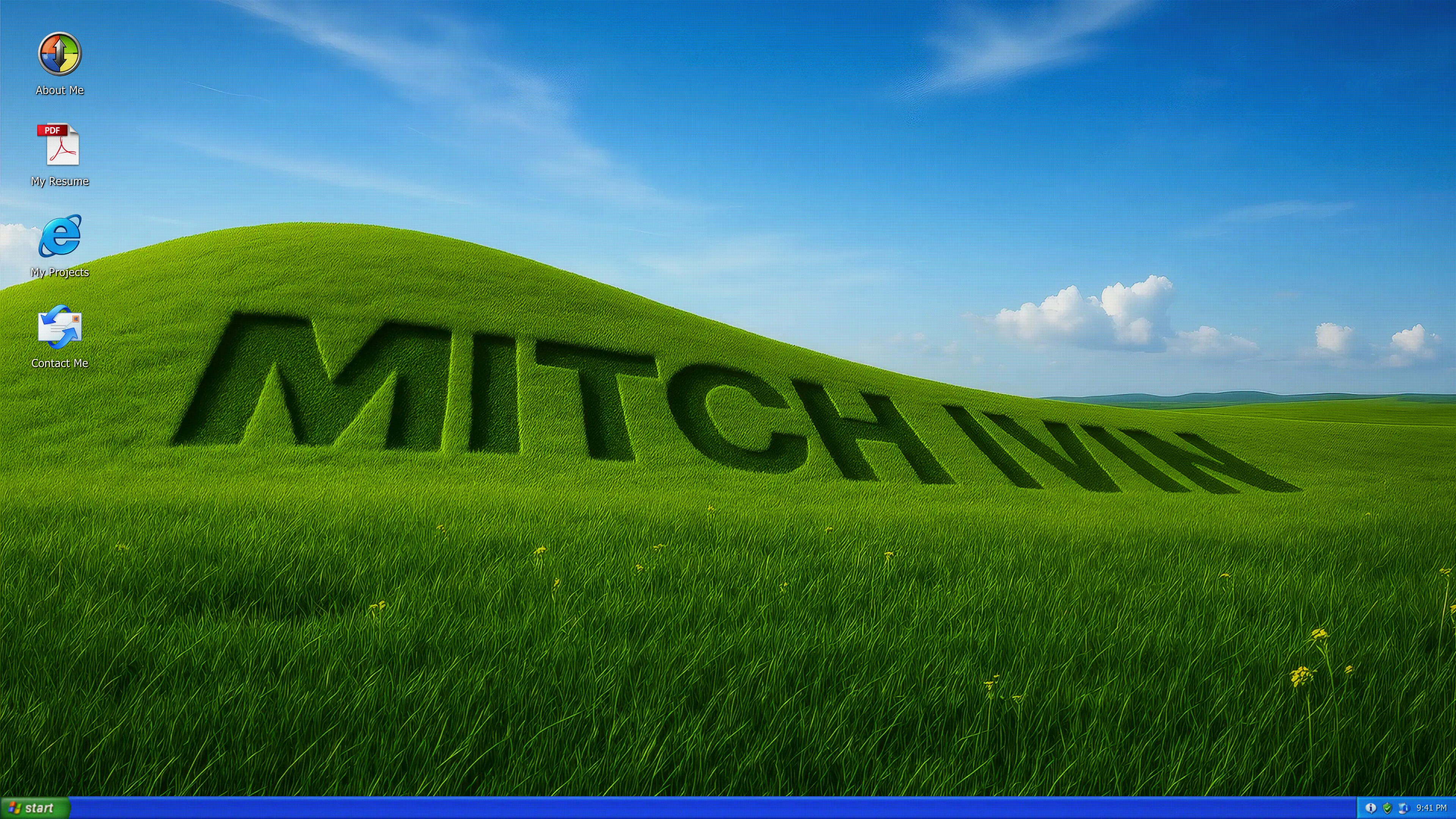 Full page screenshot of the MitchIvin XP website. A Windows XP–style interactive portfolio showcasing design, video, and UI work …